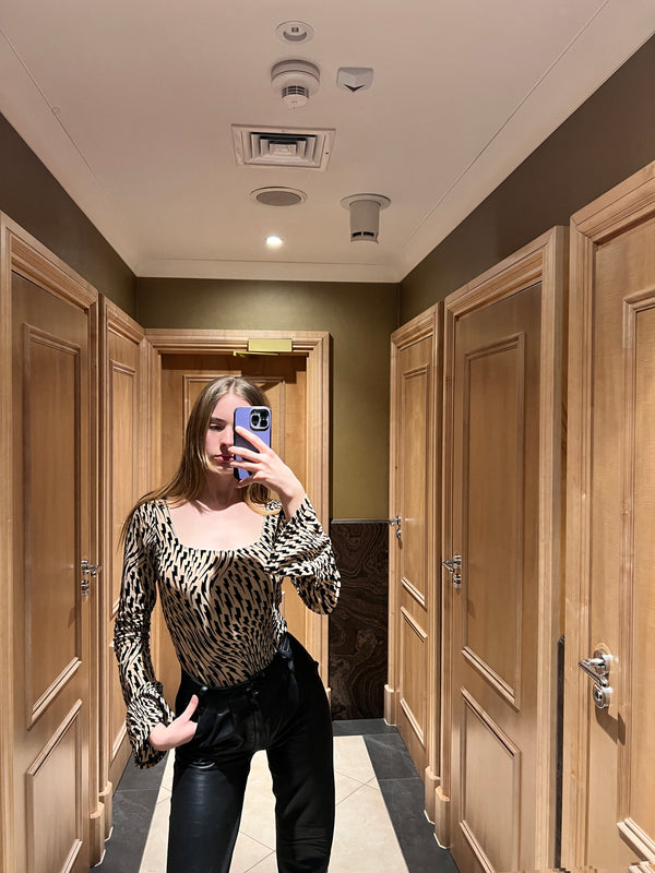Customer wearing Flock Mesh Bodysuit Nude Tattoo