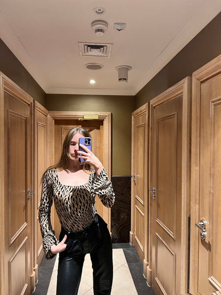 Customer wearing Flock Mesh Bodysuit Nude Tattoo